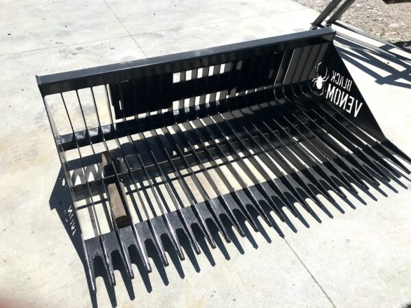 A black metal bench with the word " money " on it.