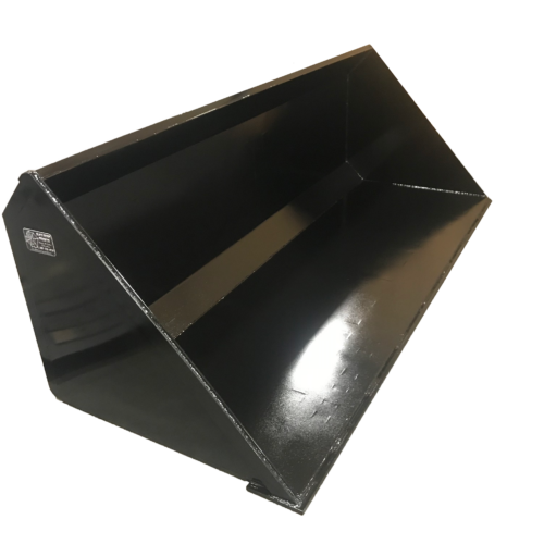 A black plastic object is shown on the ground.