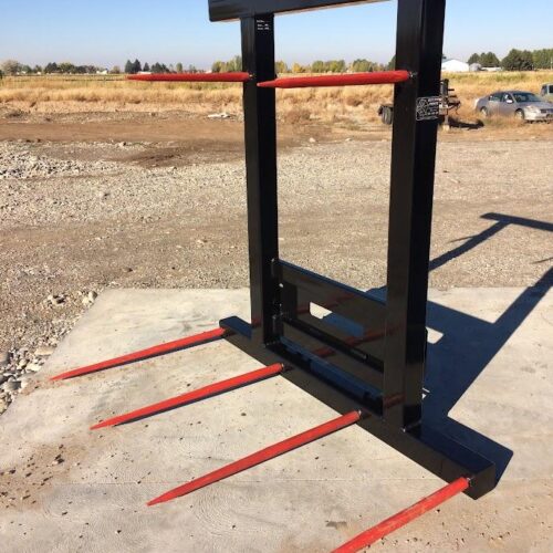 A red and black machine is on the ground