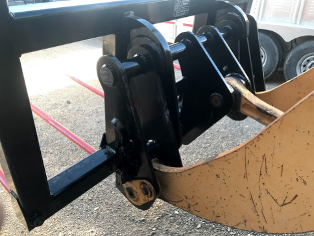Excavator bucket attachment on construction machinery.