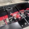 Close-up of a hydraulic component on heavy machinery.